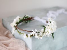 This beautiful flower crown is a lovely accessory, perfect for a party, or wedding. Our stunning faux flowers look like the real. Head circumference: one size fits all (adjustable) / fits adults and older children If the crown should fit the baby, after buying please give head circumference Estimated delivery time (exact delivery time depends on the delivery address) Europe (EU countries): 3-9 working days US, Canada: 5 - 14 days Switzerland: 14-21 day White Flower Crown Wedding, Bride Flower Crown, Wedding Floral Crown, Headband Bride, White Flower Crown, Flower Crown Bride, Floral Crown Wedding, Bride Flower, Ivory Flower