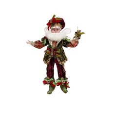 a christmas ornament with a man dressed as santa claus