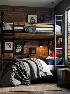 a bedroom with bunk beds and brick walls