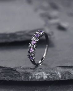 Unique art deco design, this amethyst wedding band could act as both matching band and anniversary ring Rhodium black engagement ring like no other. This AMAZING piece of fine jewelry is the perfect expression of your eternal love. Its BLACK colors bring out the beauty of this ring. ★Description *Accent stone: 0.25 Carat Square Cut Lab Created Amethyst *Accent stone: 0.32 Carat Marquise  Cut Black Moissanite,  *Band Width: Approx. 4mm ★Procedure information Please select the material and ring si Amethyst Engagement Ring And Wedding Band, Black Amethyst Rings, Black Amethyst Jewelry For Formal Occasions, Black Amethyst Jewelry For Anniversary, Black Amethyst Gemstone Ring, Formal Black Amethyst Jewelry, Elegant Black Amethyst Ring For Anniversary, Black Amethyst Promise Ring, Black Ring With Purple Stone