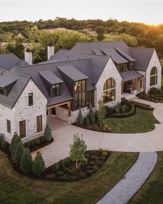 an aerial view of a large home in the country