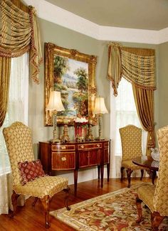 a living room filled with furniture and curtains