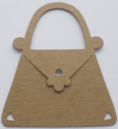 a brown paper bag with a flower cut out of it