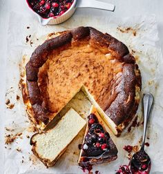 a cake with slices cut from it sitting on top of a table