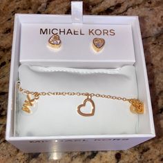 Michael Michael Kors Heart Earrings And Matching Mk Logo Bolo Style Bracelet Set Goldtone Brass New With Tags Care Booklet In Gift Box Mk Bracelet, Michael Kors Bracelet, Michael Kors Jewelry, Camping Items, Mk Logo, Girly Accessories, Michael Kors Accessories, Girly Jewelry, Pretty Jewellery