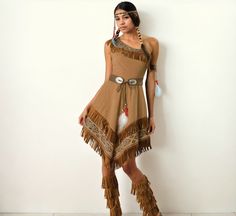 Step into a world of tradition and elegance with our Elegant Native American Inspired Costume. Perfect for stage performances, themed events, or cultural celebrations, this beautiful outfit captures the essence of Native American heritage with a modern, stylish twist. Crafted from a high-quality cotton blend with 65% polyester fiber, this costume offers both comfort and durability, allowing you to move gracefully through your event. The costume features a one-shoulder fringe dress with intricate Native American Outfits, Native American Style Outfits, Indigenous Clothing, Native American Wedding, Native American Dress, Native American Clothing, Retro Swimwear, National Costume, Native American Heritage