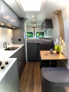 the kitchen and living area of an rv