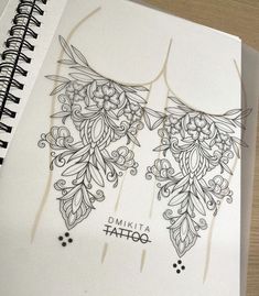 an open notebook with designs on it and the words damnita tattoo written in black ink