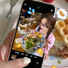 a person holding up a cell phone with food on it and an image of a woman eating