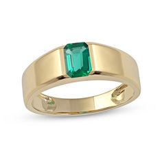 Complement your minimalist style with the refined details of this men's emerald-cut lab-created emerald solitaire band in yellow gold. Crafted in warm 10K gold This choice simply showcases a 7.0 x 5.0mm emerald-cut verdant-green lab-created emerald. The polished octagonal frame and subtle beveled edges add a sleek touch to the look. Solitaire Bands, Verdant Green, Mens Gold Wedding Band, Cute Engagement Rings, Lab Created Emerald, Gold Ring Designs, Peoples Jewellers, Emerald Gemstone, Gems Jewelry