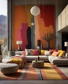 a living room filled with lots of furniture next to a large painting on the wall