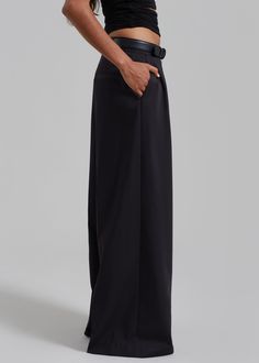 Color: Black Lightweight fluid fabric Relaxed fit Wide leg Pleated detailing Side seam pockets Illusion welt back pocket Hook and bar closure Zip fly Unlined 75% Polyester 25% Rayon Dry Clean By The Frankie Shop. Imported Chic Black Wide Leg Pants With Pressed Crease, Sleek Wide Leg Pants With Belt Loops For Evening, Sleek Wide Leg Pants For Evening With Belt Loops, Black Straight Pants With Concealed Placket, Chic Full-length Bottoms With Seam Detailing, Chic Full Length Bottoms With Seam Detailing, Chic Black Bottoms With Seam Detailing, Wide Leg Dress Pants With Side Pockets For Work, Wide Leg Full-length Pants With Pockets