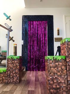 the room is decorated with purple curtains and minecraft furniture in front of a mirror