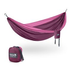 a purple hammock and backpack on a white background