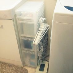 an appliance is displayed on the phone with its drawer open and it's contents in plastic bins