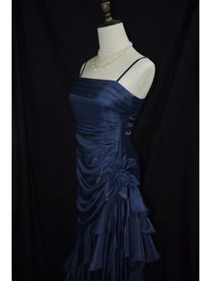 This exquisite dark blue prom gown features a vintage floral design that exudes timeless elegance. The asymmetrical hemline adds a modern twist, creating a captivating silhouette that will make you stand out at any event. Designed with delicate spaghetti straps, this dress is perfect for those special adult milestone celebrations.  Garment Size   	 		 			Size 			XS 			S 			M 			L 			XL 		 		 			Bust 			78 			82 			86 			90 			94 		 		 			Waist 			60 			64 			68 			72 			76 		 		 			Hips 			84 Dark Blue And Silver Dress, Midnight Blue Homecoming Dress, Navy Blue Dress Homecoming, Dark Blue Star Dress, 80s Hoco Dress, Cute Grad Dresses Grade 8, Old Hollywood Hoco Dress, 2000 Dress Early 2000s, Prom Dresses High School