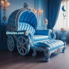 a blue and white horse drawn carriage sitting in front of a window with curtains on the windowsill