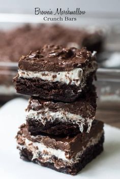 three chocolate desserts stacked on top of each other