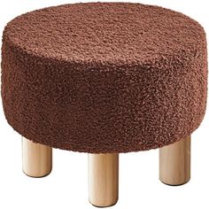 a brown stool with two wooden legs and a round cushion on the top of it