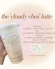 a hand holding up a starbucks cup with the words, the cloudy chai latte