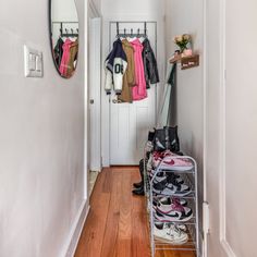 the hallway is clean and ready to be used as a dressing room or bedroom area