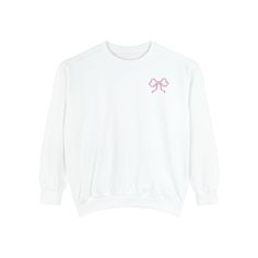 Our Pink Bow Crewneck Sweatshirt comes in Comfort Colors style.  It's made with 80% ring-spun cotton and 20% polyester.  Comfort Colors crewnecks have relaxed fit, a rolled-forward shoulder, and a back neck  *Size up for an oversized look 80% ring-spun cotton, 20% polyesterMedium-heavy fabricRelaxed fit   S M L XL 2XL Pink Sweatshirt, Pink Bow