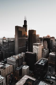 an aerial view of some very tall buildings