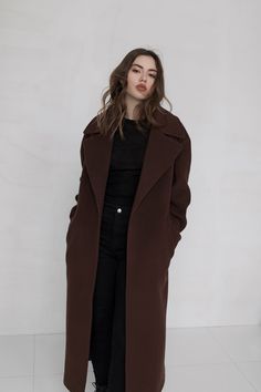 Oversized brown coat Brown Coat Women Description: This brown cashmere blend oversized coat features a wide collar, midi length, and lowered shoulders line. Comfortable side pockets and a belt that emphasizes the waist.We can make our coats warmer to suit for a cool winter and weather below 0°C. If you want us to do this, PM us, and we will reply you as soon as possible. Details: Wrap style Lowered shoulders line Two pockets Belt Сomposition: Cashmere 80% Wool 20%Lining viscose 100% Brown Coat Outfit Winter, Long Brown Coat Outfit, Brown Long Coat Outfit, Wedding Skirt Top, Brown Coat Outfit, Long Brown Dress, Autumn Coats, Long Brown Coat, Silk Bridal Gown