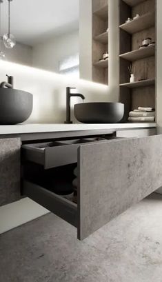 a modern bathroom with two sinks and shelves