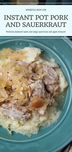 instant pot pork and sauerkraut on a blue plate with mashed potatoes