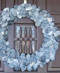 a close up of a wreath made out of rocks with knives and forks in it