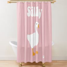 a pink shower curtain with a white duck and the words silly on it's side