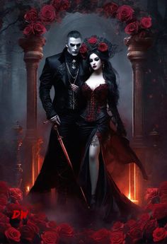 a man and woman dressed up in gothic clothing standing next to each other with roses around them