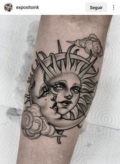 a sun and moon tattoo on the leg