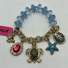 Betsey Johnson Nautical Sea Charm Half Stretch Bracelet Fits Size 6.5" - 7" Wrist - 5 Large Charms 5 Pearls/Diamond Charms Gold Metal Hardware - Iconic Betsey Johnson Logo Dangle Charm - Stretch - 30+ Rhinestones 10 Faceted Blue Beads Retail 125 Diamond Charm, Betsey Johnson Jewelry, Sea Ocean, Pearl Diamond, Dangle Charms, Blue Bracelet, Blue Beads, Rain And Snow Boots, Stretch Bracelet