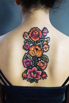 three different tattoos with flowers on them