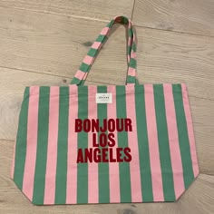 Szane "Bonjour Los Angeles” Striped Canvas Tote. Brand New, In Pristine Condition, And Never Used, Although Please Note Tags Are Not Attached. Pink-And-Green Striped. Dimensions Are 21”L X 13”D X 6”W And 10" Drop Material: 100% Cotton. Machine Washable. Canvas Beach Bag, Striped Bags, Copenhagen Style, Eco Bag, Handbag Shoes, Shopper Bag, Pink Stripes, Arm Candy, Canvas Tote Bag