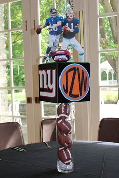 a football themed centerpiece on top of a table