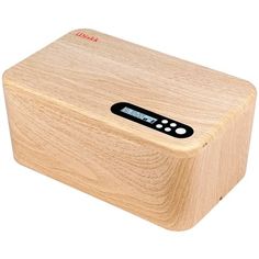 a wooden box with an electronic device on it