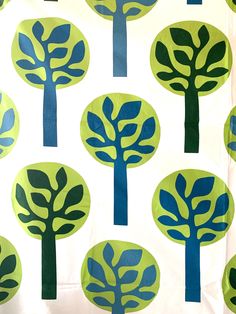 a green and blue tree pattern on a white background