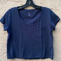 Cutest Loose-Fit Crop Top In Soft 100% Cotton. Round, Ribbed Neckline, Gently Dropped Shoulders, And Short Sleeves Tee Classic And Simple Pit To Pit: 19.5” Length: 17.5” Sleeve Length: 5” Approx New! Never Worn! Basic Blue Cotton Crop Top, Blue Cotton Scoop Neck Crop Top, Blue Cropped Cotton T-shirt, Basic H&m Tops For Everyday, Basic Everyday H&m Tops, Casual Navy Tops For Everyday, Blue Cotton Crew Neck Crop Top, H&m Cotton Crew Neck Top, Basic Navy Cotton Tops