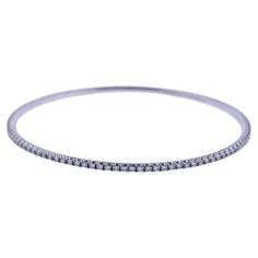 Tiffany & Co 18k white gold eternity bangle bracelet, with a total of 106 stones - approx. 1.60ctw G/VS. Bracelet will fit approx. 7" wrist (inner diameter is 60mm or 2 3/8") width of the bracelet is 2.1mm. Marked: Tiffany 7 Co, 750, Belgium. Weight - 11.6 grams. 18k Gold Bangle, White Gold Diamond Bracelet, Tiffany And Co Bracelet, White Gold Bangle, Vintage Bangle Bracelets, Fishing Bracelet, Louis Comfort Tiffany, Gold Armband, Vintage Bangles