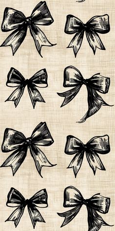 black and white bows drawn on wood grained paper by hand with inking technique