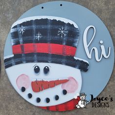 a snowman sign with the word hi written on it