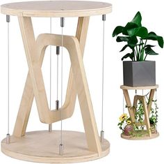 a wooden table with two plant stands and a potted plant