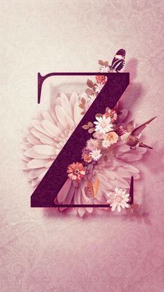 the letter z is made up of flowers and leaves on a pink background with a white flower