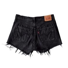 ○ Introducing the perfect addition to your summer wardrobe - these Levis 501 Black Denim Cut-Off Buttonfly Shorts in Size 29! Made from high-quality denim, these shorts are not only stylish but also comfortable to wear all day long.  ○ Brand: Levi's ○ 100% cotton ○ Size 28 ○ Measurements (taken flat) waist: 15.5" hips: 18.5" rise: 11" inseam: 2.5" total length: 12" ○ Great pre-loved condition. Minor wear signs but no visible flaws. Please look at the pictures since they are considered part of th Levis 501 Black, Levi 501 Shorts, Levi Jean Shorts, Black Jean Shorts, Levis 501, Cut Off Shorts, Skorts, Black Denim Shorts, Summer Wardrobe