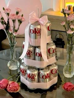 a cake made out of cans and flowers