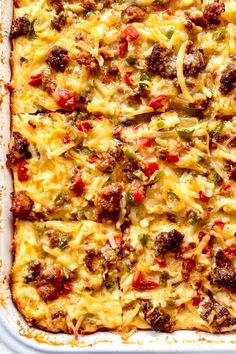 a casserole dish with meat, cheese and vegetables in it is ready to be eaten