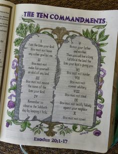 an open bible with the ten commandments on it